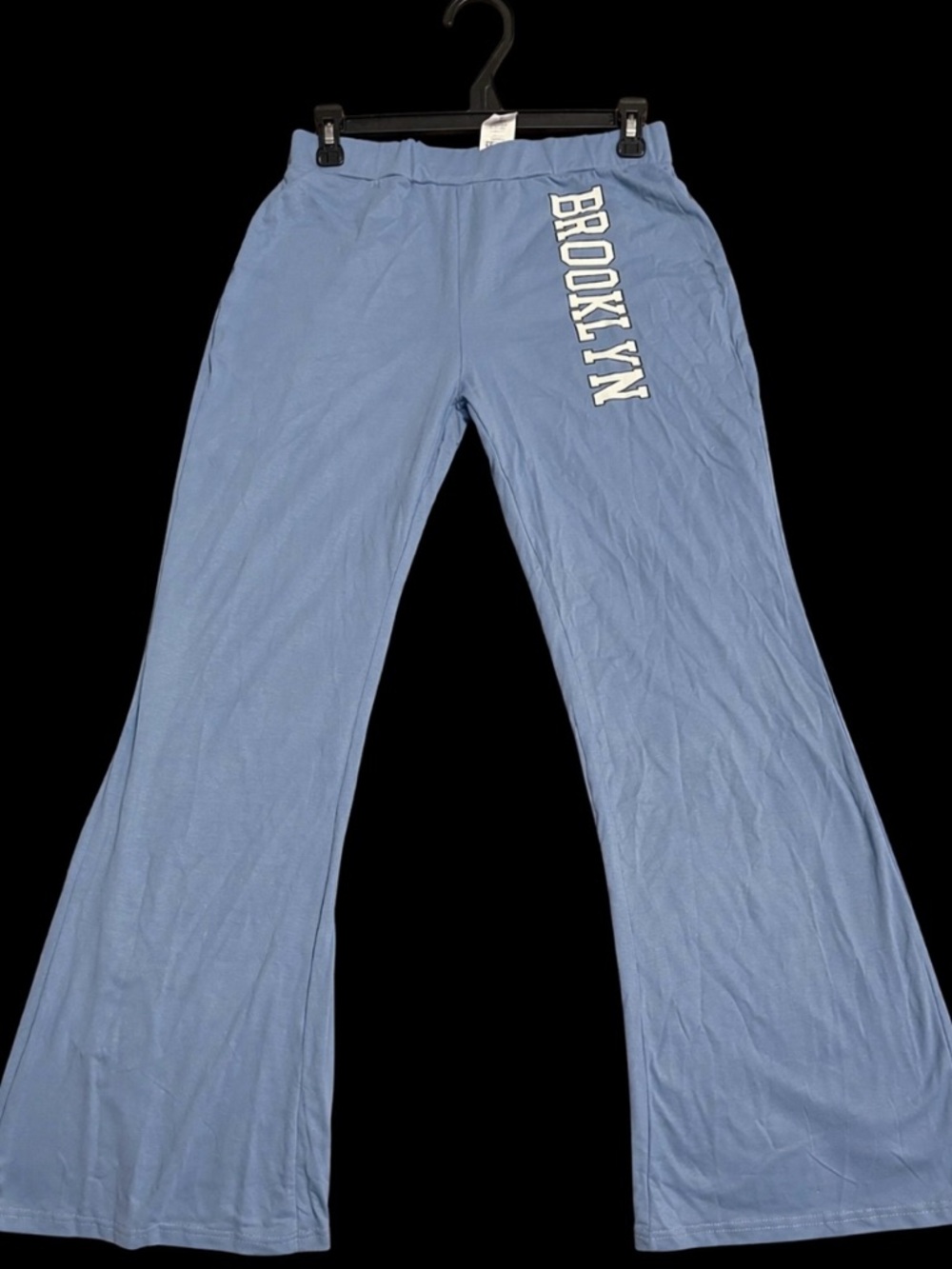 Fashion Nova Light Blue Wide Leg Pants with BROOKLYN Print